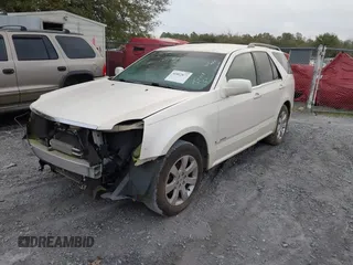 2008 Cadillac SRX RWD z VIN 1GYEE637580123768, wystawiony jako IAAI lot #41802877 z przebiegiem 149 249 mil mil oraz . Historia ofert i sprzedaży dostępna na DreamBid. Obrazek 2.