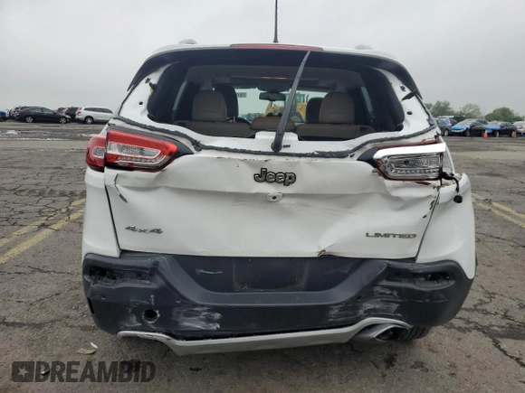 2018 Jeep Cherokee Limited with VIN 1C4PJMDX4JD521615, listed as a Copart auction lot 57250535 with 144,248 mi miles and Salvage title. Bid and sale history available at DreamBid. Image 6.