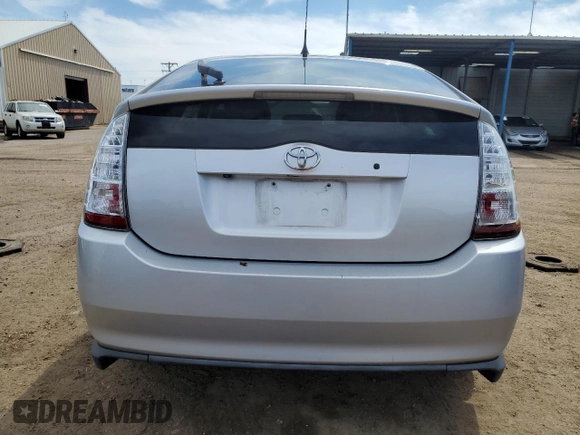 2007 Toyota Prius z VIN JTDKB20U377090358, wystawiony jako Copart lot #56599325 z przebiegiem 152 754 mil mil oraz Szkoda całkowita • Salvage title. Historia ofert i sprzedaży dostępna na DreamBid. Obrazek 6.