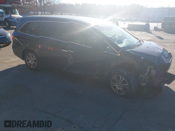 2011 Honda Odyssey EX-L with VIN 5FNRL5H61BB059275, listed as a IAAI auction lot 41293690 with 105,511 mi miles and . Bid and sale history available at carsss.com. Image 1.