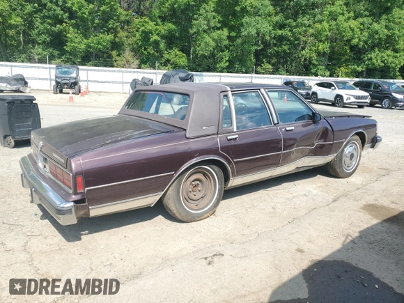1987 Chevrolet Caprice z VIN 1G1BU51H7H9156079, wystawiony jako Copart lot #60443124 z przebiegiem 44 452 mil mil oraz Szkoda całkowita • Salvage title. Historia ofert i sprzedaży dostępna na DreamBid. Obrazek 3.