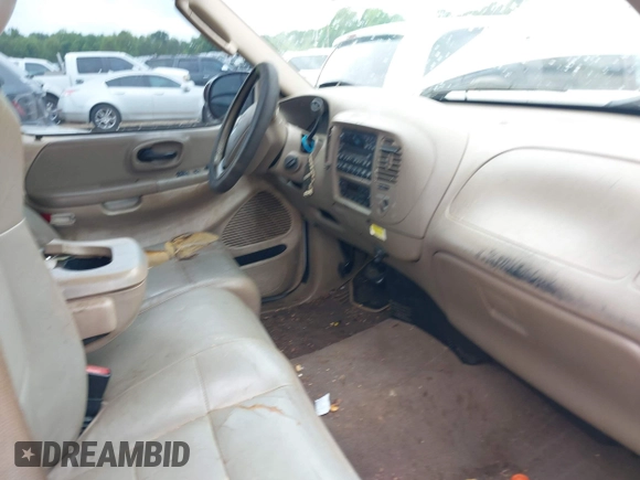 2003 Ford F-150 XL with VIN 1FTRX17L63NA96992, listed as a IAAI auction lot 42216908 with 328,976 mi miles and . Bid and sale history available at DreamBid. Image 5.