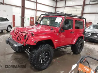2011 Jeep Wrangler Sahara with VIN 1J4AA5D10BL593534, listed as a IAAI auction lot 41551416 with 101,716 mi miles and . Bid and sale history available at DreamBid. Image 2.