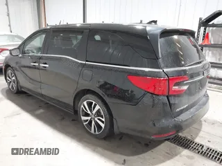 2023 Honda Odyssey Touring z VIN 5FNRL6H85PB039450, wystawiony jako IAAI lot #41504351 z przebiegiem 51 000 mil mil oraz . Historia ofert i sprzedaży dostępna na DreamBid. Obrazek 3.