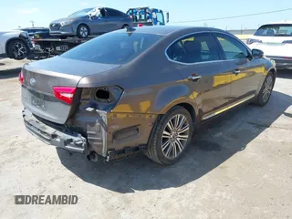 2014 Kia Cadenza Premium with VIN KNALN4D70E5152333, listed as a IAAI auction lot 42047660 with 107,686 mi miles. Bid and sale history available at carsss.com. Image 4.