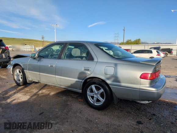 2001 Toyota Camry LE z VIN JT2BF22K810291438, wystawiony jako Copart lot #54261565 z przebiegiem 174 101 mil mil oraz Szkoda całkowita • Salvage title. Historia ofert i sprzedaży dostępna na DreamBid. Obrazek 2.