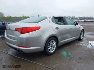 2011 Kia Optima LX with VIN KNAGM4A76B5146718, listed as a IAAI auction lot 42006225 with 213,939 mi miles. Bid and sale history available at carsss.com. Image 4.