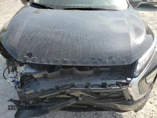 2024 Mitsubishi Eclipse Cross LE z VIN JA4ATVAA7RZ062742, wystawiony jako Copart lot #60561235 z przebiegiem 12 680 mil mil oraz Szkoda całkowita • Salvage title. Historia ofert i sprzedaży dostępna na DreamBid. Obrazek 12.
