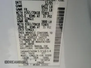 2006 Nissan Titan SE z VIN 1N6AA07A06N535614, wystawiony jako Copart lot #59762005 z przebiegiem 130 296 mil mil oraz Szkoda całkowita • Salvage title. Historia ofert i sprzedaży dostępna na DreamBid. Obrazek 12.