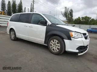 2018 Dodge Grand Caravan SE with VIN 2C4RDGBG4JR176894, listed as a Copart auction lot 51981155 with 125,700 mi miles and Salvage Title. Bid and sale history available at carsss.com. Image 4.