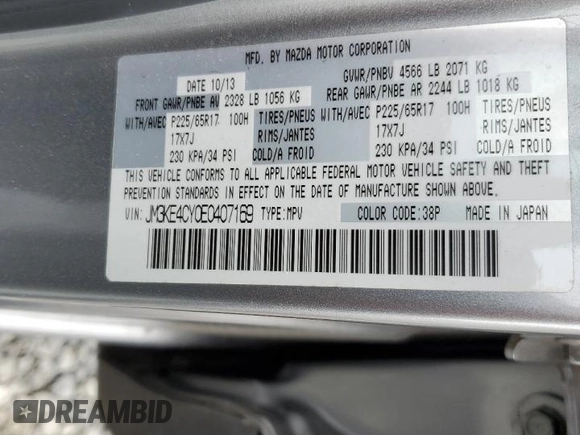 2014 Mazda CX-5 Touring z VIN JM3KE4CY0E0407169, wystawiony jako Copart lot #57877215 z przebiegiem 168 277 mil mil oraz Szkoda całkowita • Salvage title. Historia ofert i sprzedaży dostępna na DreamBid. Obrazek 13.