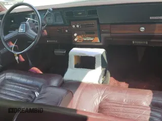 1987 Chevrolet Caprice z VIN 1G1BU51H7H9156079, wystawiony jako Copart lot #60443124 z przebiegiem 44 452 mil mil oraz Szkoda całkowita • Salvage title. Historia ofert i sprzedaży dostępna na DreamBid. Obrazek 8.