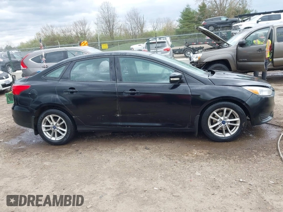 2016 Ford Focus SE with VIN 1FADP3F26GL280805, listed as a IAAI auction lot 42031492 with 146,986 mi miles. Bid and sale history available at carsss.com. Image 13.
