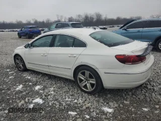 2013 Volkswagen CC Sport Plus z VIN WVWBP7AN1DE555927, wystawiony jako Copart lot #49028445 z przebiegiem 132 109 mil mil oraz Szkody całkowita. Historia ofert i sprzedaży dostępna na DreamBid. Obrazek 2.