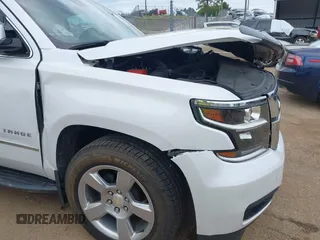 2020 Chevrolet Tahoe LT with VIN 1GNSCBKC4LR181887, listed as a IAAI auction lot 42160821 with 106,757 mi miles and . Bid and sale history available at DreamBid. Image 19.