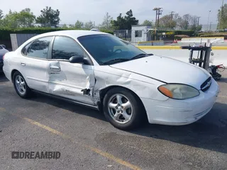 2003 Ford Taurus SES Standard with VIN 1FAFP55293G176494, listed as a IAAI auction lot 42040985 with 95,550 mi miles. Bid and sale history available at carsss.com. Image 1.