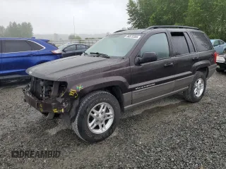 2004 Jeep Grand Cherokee Laredo z VIN 1J4GX48S54C163149, wystawiony jako Copart lot #56875305 z przebiegiem 113 931 mil mil oraz Szkoda całkowita • Salvage title. Historia ofert i sprzedaży dostępna na DreamBid. Obrazek 1.