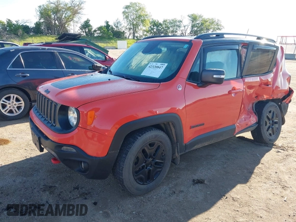 2018 Jeep Renegade Trailhawk z VIN ZACCJBCB6JPH44846, wystawiony jako IAAI lot #42320847 z przebiegiem 103 004 mil mil oraz . Historia ofert i sprzedaży dostępna na DreamBid. Obrazek 2.