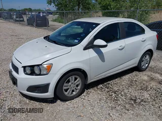 2012 Chevrolet Sonic LT z VIN 1G1JC5SH8C4176795, wystawiony jako IAAI lot #42291906 z przebiegiem Nie podano mil oraz . Historia ofert i sprzedaży dostępna na DreamBid. Obrazek 17.