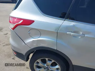 2013 Ford Escape SEL with VIN 1FMCU9H99DUA11243, listed as a IAAI auction lot 42356731 with 154,937 mi miles and . Bid and sale history available at DreamBid. Image 17.