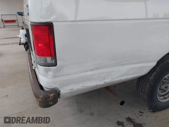2014 Ford Econoline Cargo Commercial with VIN 1FTNS2EW6EDA03445, listed as a IAAI auction lot 41973556 with 231,391 mi miles. Bid and sale history available at carsss.com. Image 6.