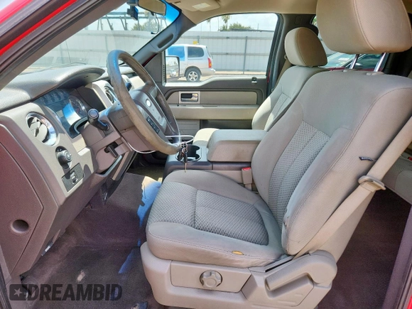 2009 Ford F-150 XL with VIN 1FTPW14V39KC73007, listed as a Copart auction lot 61447595 with 185,983 mi miles and Salvage title. Bid and sale history available at DreamBid. Image 7.