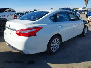 2016 Nissan Altima SV with VIN 1N4AL3APXGC211956, listed as a IAAI auction lot 41332338 with 115,309 mi miles and . Bid and sale history available at DreamBid. Image 4.