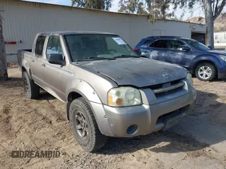 2004 Nissan Frontier XE z VIN 1N6ED27T14C427341, wystawiony jako IAAI lot #41498974 z przebiegiem 210 613 mil mil oraz . Historia ofert i sprzedaży dostępna na DreamBid. Obrazek 1.