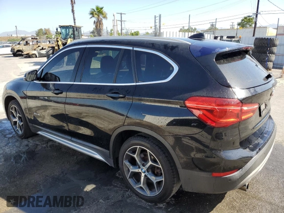 2017 BMW X1 sDrive28i z VIN WBXHU7C34HP924632, wystawiony jako Copart lot #56169005 z przebiegiem 203 811 mil mil oraz Czysty tytuł • Clean title. Historia ofert i sprzedaży dostępna na DreamBid. Obrazek 2.