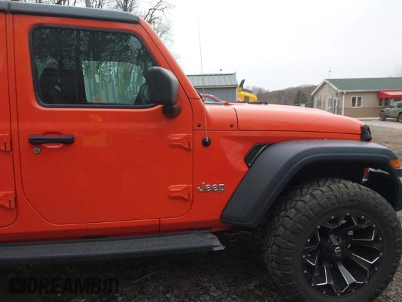 2018 Jeep Wrangler Unlimited Sport z VIN 1C4HJXDN4JW198045, wystawiony jako IAAI lot #41930547 z przebiegiem 62 402 mil mil oraz . Historia ofert i sprzedaży dostępna na DreamBid. Obrazek 14.