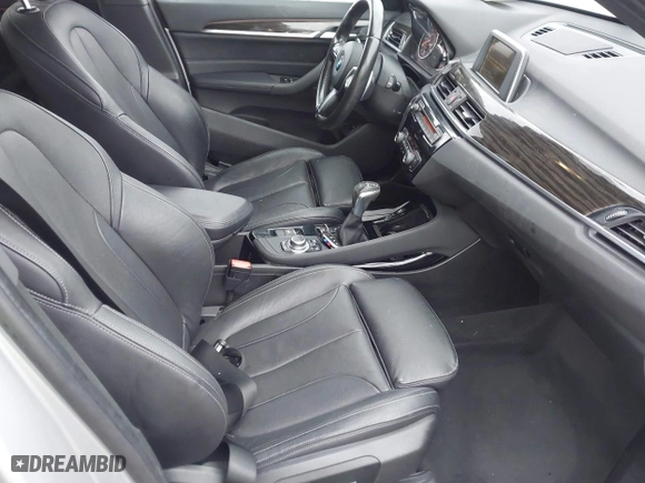 2016 BMW X1 xDrive28i with VIN WBXHT3C3XG5E51358, listed as a IAAI auction lot 41730597 with 90,010 mi miles. Bid and sale history available at carsss.com. Image 5.
