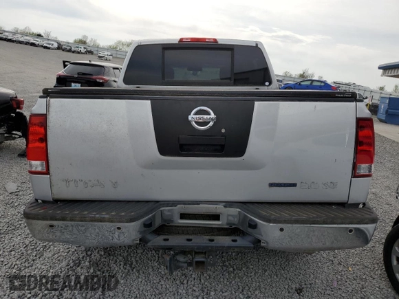 2010 Nissan Titan SE with VIN 1N6BA0ED9AN313471, listed as a Copart auction lot 53699235 with 218,649 mi miles and Clean Title. Bid and sale history available at carsss.com. Image 6.