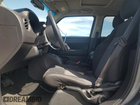 2011 Jeep Patriot Sport with VIN 1J4NF1GBXBD279089, listed as a Copart auction lot 53934335 with 127,928 mi miles and Salvage Title. Bid and sale history available at carsss.com. Image 7.
