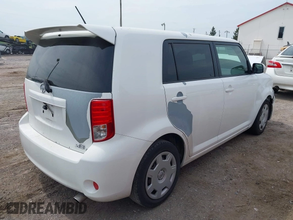 2012 Scion xB with VIN JTLZE4FE4CJ004977, listed as a IAAI auction lot 42116864 with 119,206 mi miles. Bid and sale history available at carsss.com. Image 4.