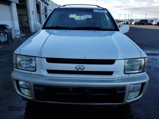 2000 Infiniti QX4 z VIN JNRAR07Y3YW084474, wystawiony jako Copart lot #87089994 z przebiegiem 237 974 mil mil oraz Szkody całkowita. Historia ofert i sprzedaży dostępna na DreamBid. Obrazek 5.
