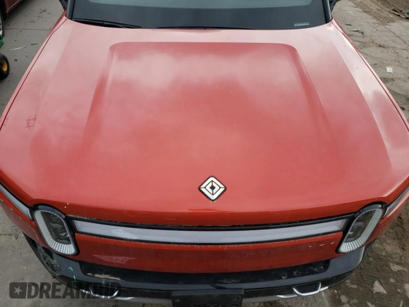 2023 Rivian R1T Adventure with VIN 7FCTGAAA2PN026211, listed as a Copart auction lot 77705414 with Not Provided miles and Salvage Title. Bid and sale history available at DreamBid. Image 11.