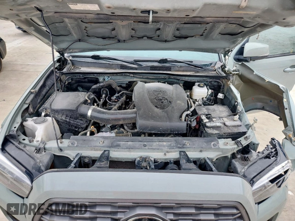 2023 Toyota Tacoma SR with VIN 3TMCZ5AN2PM580515, listed as a Copart auction lot 60422635 with 65,846 mi miles and Salvage title. Bid and sale history available at DreamBid. Image 11.