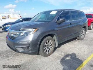 2021 Honda Pilot EX-L with VIN 5FNYF5H56MB011624, listed as a IAAI auction lot 41628621 with 30,645 mi miles. Bid and sale history available at carsss.com. Image 2.