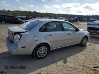 2006 Suzuki Forenza z VIN KL5JD56Z66K299816, wystawiony jako Copart lot #81893914 z przebiegiem 156 416 mil mil oraz Szkoda całkowita • Salvage title. Historia ofert i sprzedaży dostępna na DreamBid. Obrazek 3.