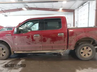2015 Ford F-150 XLT with VIN 1FTEW1EG8FFA41398, listed as a IAAI auction lot 42102711 with 129,812 mi miles and . Bid and sale history available at DreamBid. Image 14.