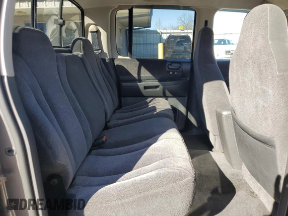 2004 Dodge Dakota Sport z VIN 1D7HG38K94S556894, wystawiony jako Copart lot #79743994 z przebiegiem 174 933 mil mil oraz Szkoda całkowita • Salvage title. Historia ofert i sprzedaży dostępna na DreamBid. Obrazek 11.
