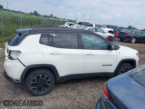2019 Jeep Compass Trailhawk z VIN 3C4NJDDB3KT760631, wystawiony jako IAAI lot #42681139 z przebiegiem 71 128 mil mil oraz . Historia ofert i sprzedaży dostępna na DreamBid. Obrazek 13.