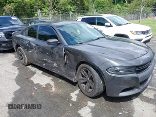 2015 Dodge Charger SXT with VIN 2C3CDXHGXFH790959, listed as a IAAI auction lot 42255901 with 135,420 mi miles and . Bid and sale history available at DreamBid. Image 1.