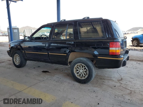 1994 Jeep Grand Cherokee Limited with VIN 1J4GZ78S5RC304501, listed as a Copart auction lot 64632335 with 184,333 mi miles and Salvage title. Bid and sale history available at DreamBid. Image 2.