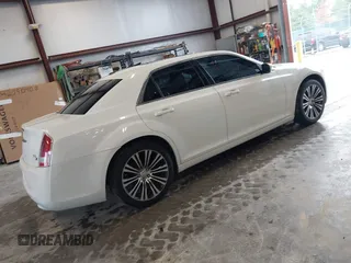 2012 Chrysler 300 S with VIN 2C3CCABG3CH279291, listed as a IAAI auction lot 42119120 with 178,039 mi miles and . Bid and sale history available at carsss.com. Image 4.