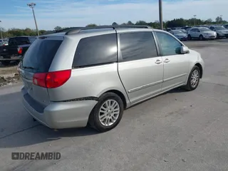 2008 Toyota Sienna XLE with VIN 5TDZK22C18S161339, listed as a IAAI auction lot 41449450 with 202,512 mi miles. Bid and sale history available at carsss.com. Image 4.