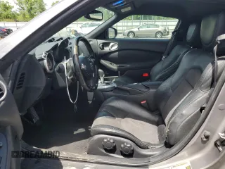 2009 Nissan 370Z z VIN JN1AZ44E69M409779, wystawiony jako Copart lot #55615955 z przebiegiem 132 674 mil mil oraz Szkoda całkowita • Salvage title. Historia ofert i sprzedaży dostępna na DreamBid. Obrazek 7.