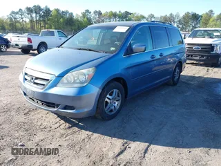 2005 Honda Odyssey EX-L with VIN 5FNRL38605B037065, listed as a IAAI auction lot 42042666 with 228,908 mi miles. Bid and sale history available at carsss.com. Image 2.
