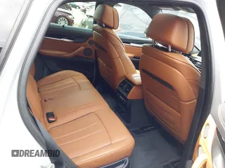 2016 BMW X6 xDrive50i z VIN 5UXKU6C57G0R33572, wystawiony jako IAAI lot #42103956 z przebiegiem 65 520 mil mil oraz . Historia ofert i sprzedaży dostępna na DreamBid. Obrazek 7.