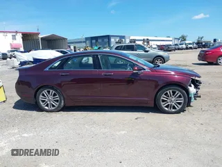 2013 Lincoln MKZ z VIN 3LN6L2GKXDR824996, wystawiony jako IAAI lot #42574204 z przebiegiem 81 370 mil mil oraz . Historia ofert i sprzedaży dostępna na DreamBid. Obrazek 13.